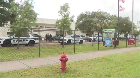 Parent picking up student at Dillard Elementary School apprehended after allegedly jumping fence